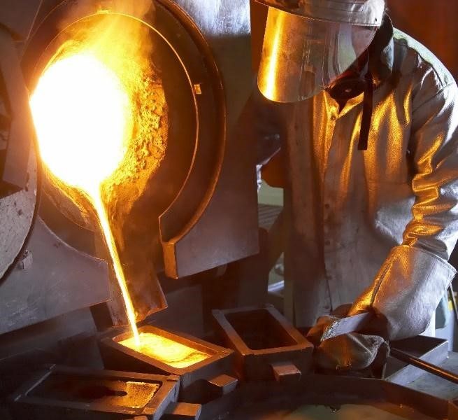 Molten gold refining